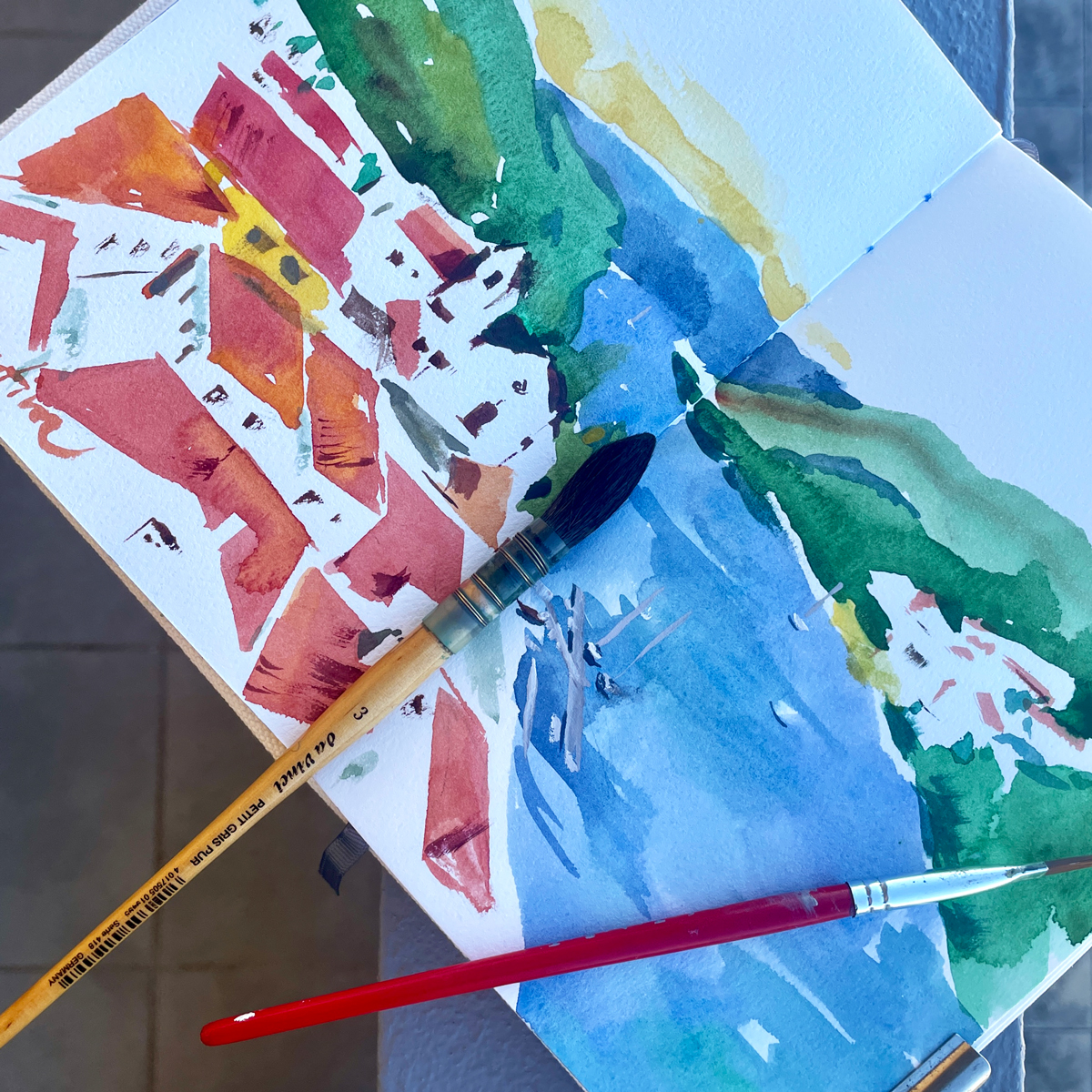 Sketchbook Spread – Alcoutim, Rio Guadiana & Sanlúcar Landscape in Watercolor Watercolor sketchbook spread depicting the landscape of Alcoutim, the Rio Guadiana, and Sanlúcar across the border.