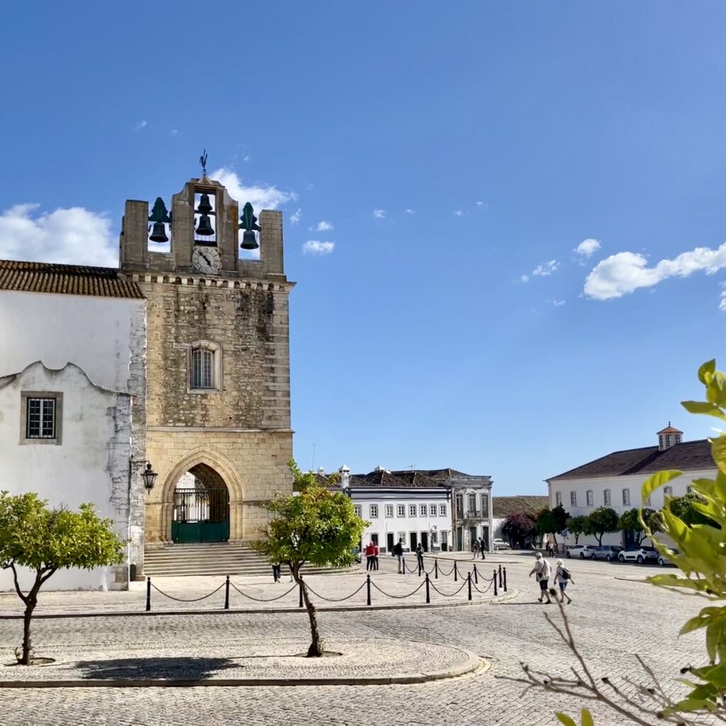 Largo da Sé, Faro – Cathedral Square in Cidade Velha Photo of Largo da Sé in Faro, with the Faro Cathedral (Sé) and surrounding cobblestone square.