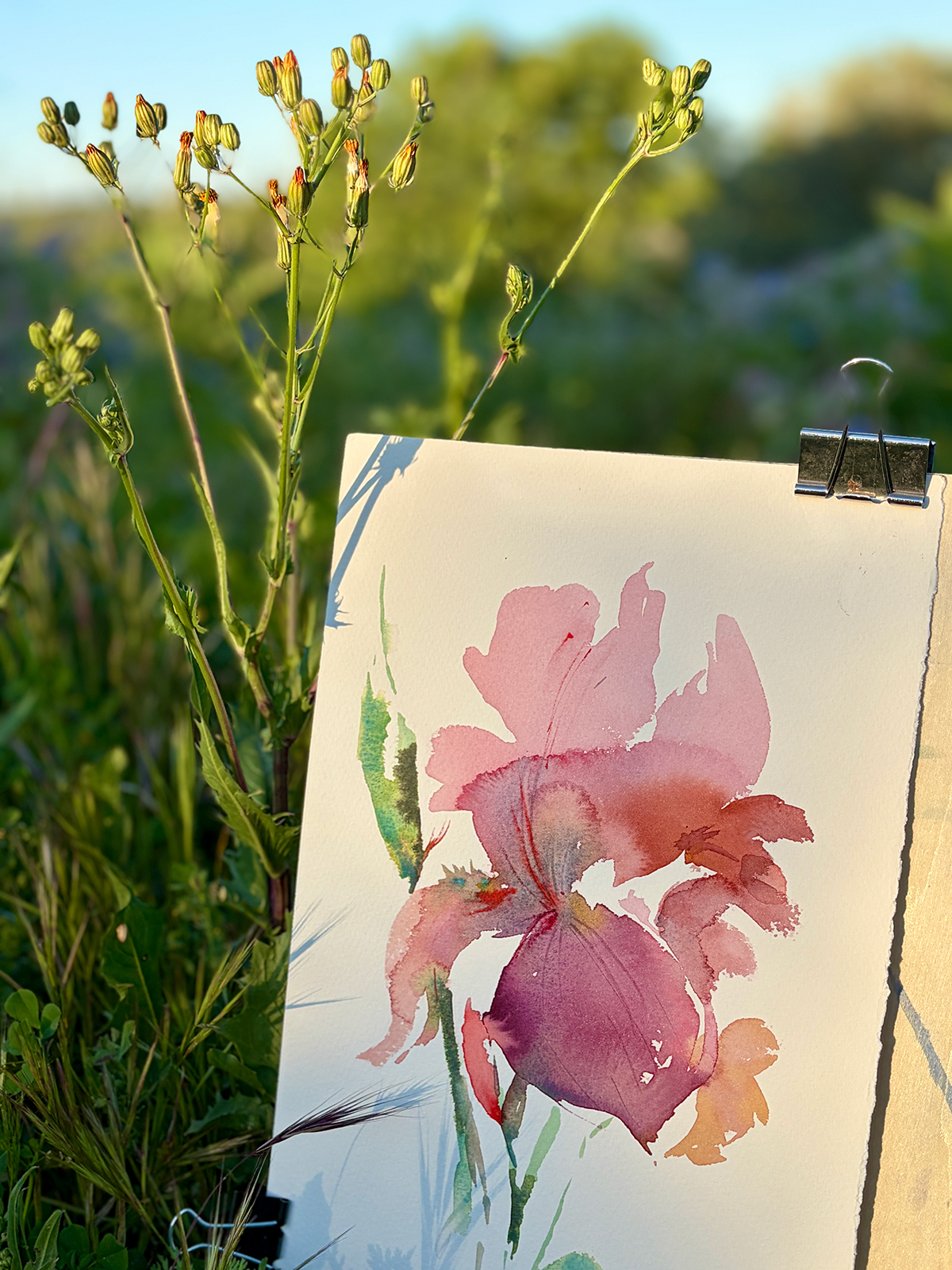 Bright yellow entrance door in Olhão with traditional hand-shaped doorknobs
